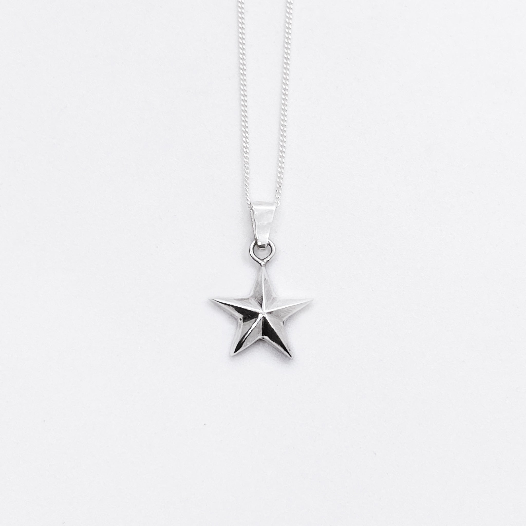 Cadena-dije-estrella-doble-diseno-flame-web-01.jpg